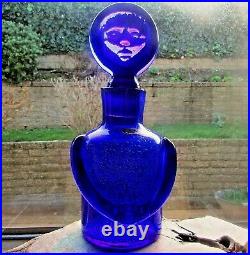 A bottle designed by Erik Hoglund for Kosta Boda with original Boda label